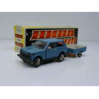 Коллекционная модель Ваз 2121 Нива со скифом, голубая, сделана в России в 1992 году. Масштаб 1:43. В оригинальной коробке. Открываются двери капот, багажник, поворачиваются колеса.